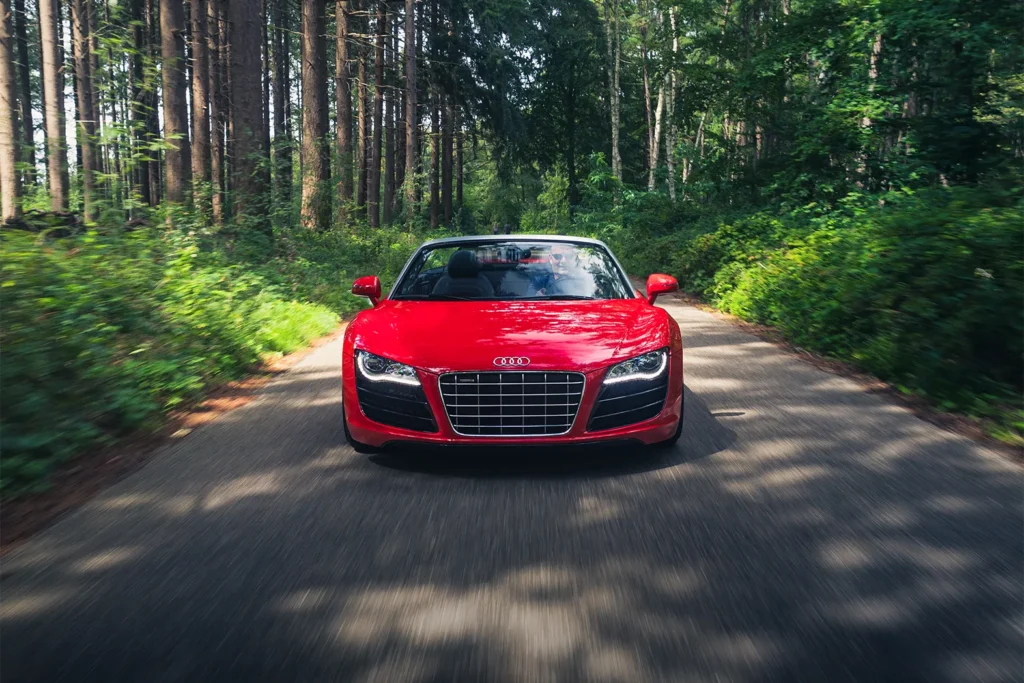 Auto fotografie rijdende Audi R8 Spyder auto fotoshoot Huizen